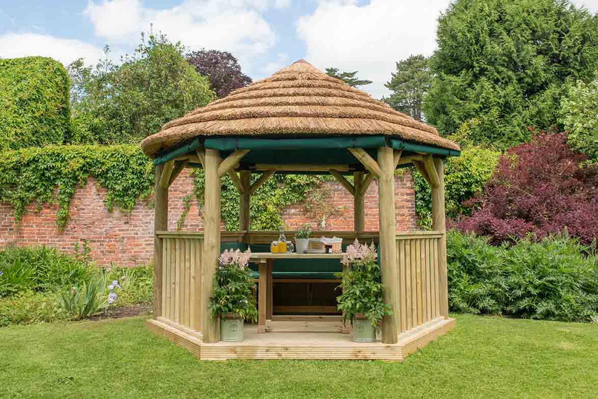 Image for Forest 3.6m Hexagonal Wooden Garden Gazebo with Thatched Roof - Green Lining