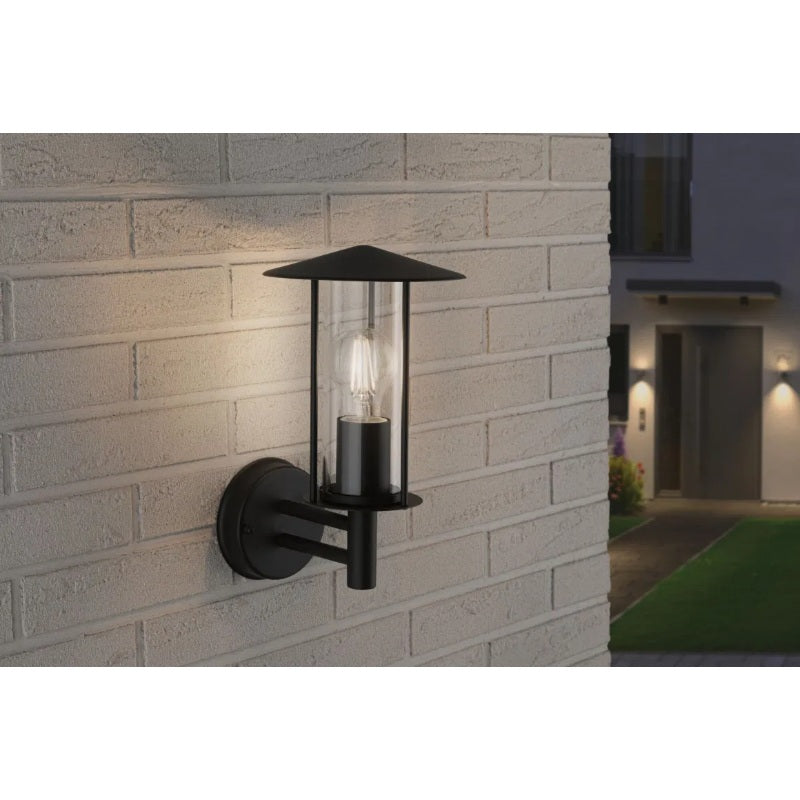 Black outdoor wall light with glass shade, classic design by Paulmann, suitable for exterior lighting.