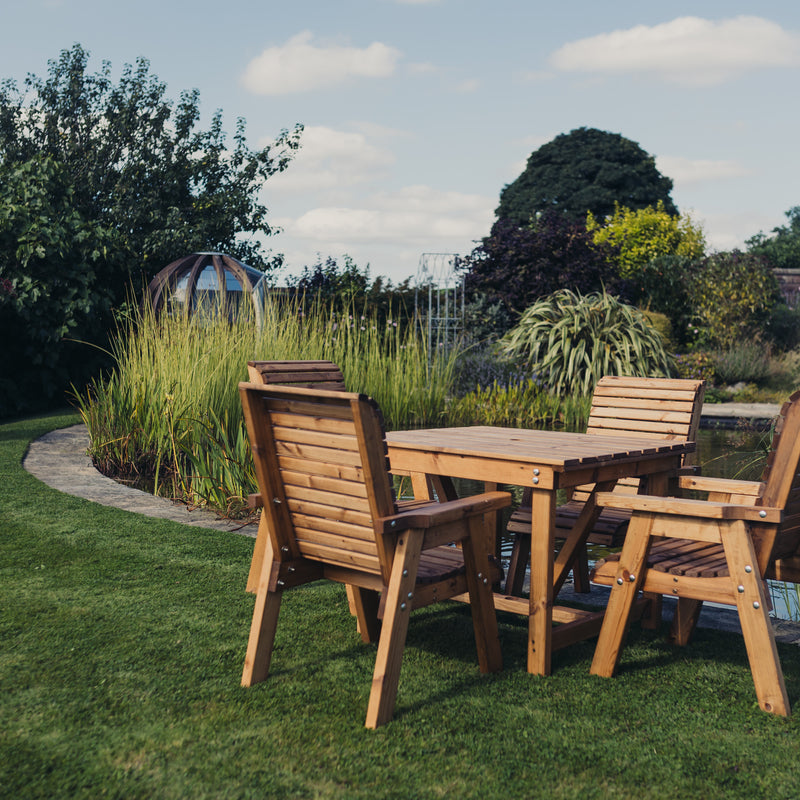 Churnet Valley wooden 4-seater square garden table set with four matching chairs in a natural finish.