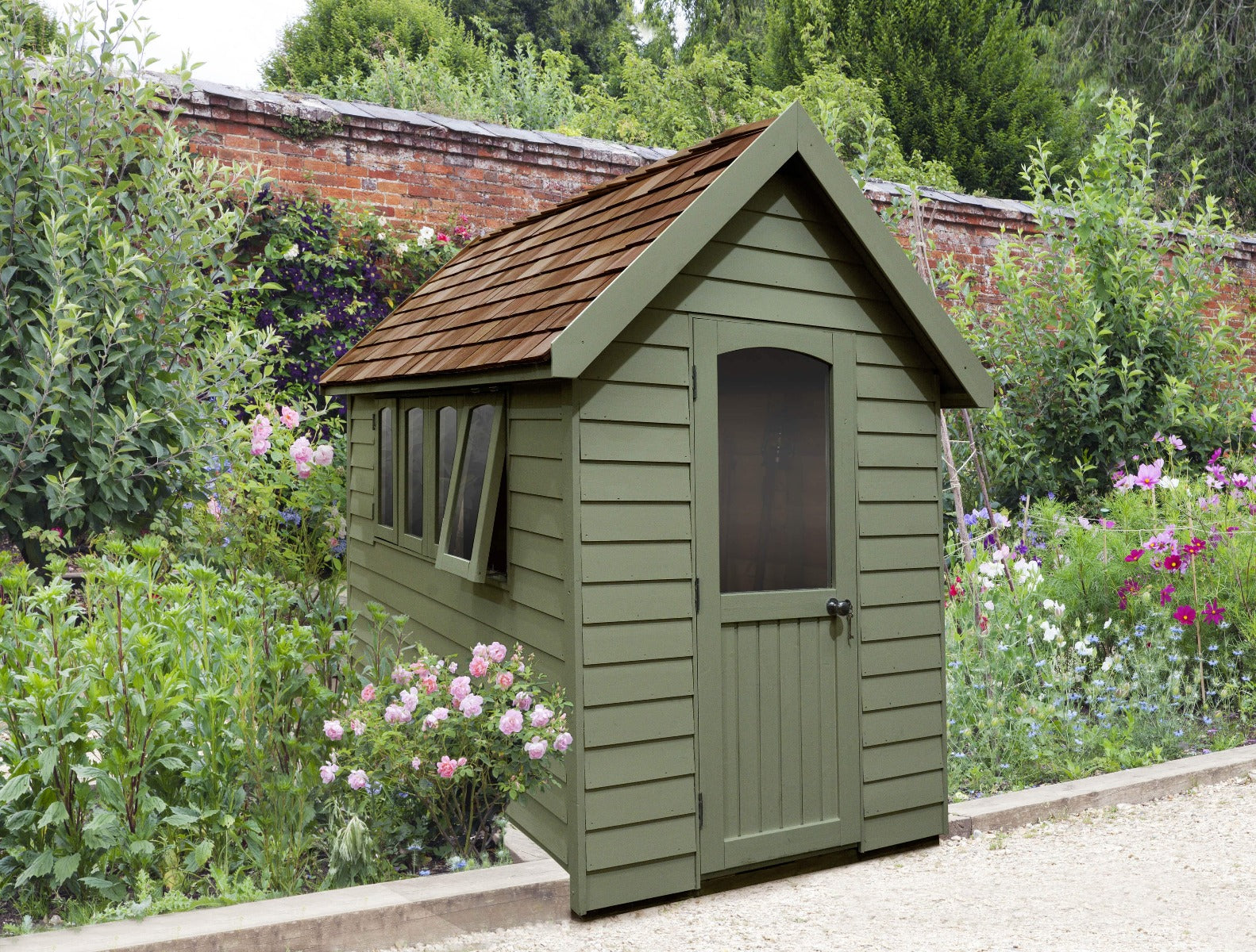 Moss green wooden garden shed with a brown shingle roof and window, 8 x 5 ft by Forest Garden.