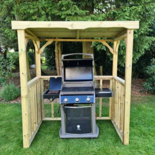 Churnet Valley Emily BBQ Hut with wooden frame and gas grill, designed for outdoor cooking