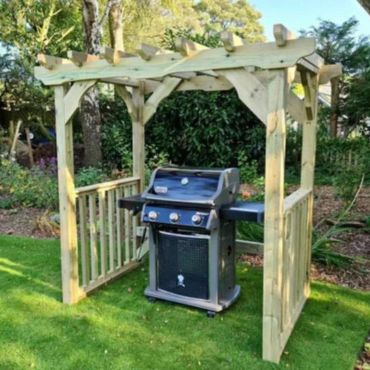 Churnet Valley Lilly BBQ hut with wooden frame and grill, designed for outdoor cooking