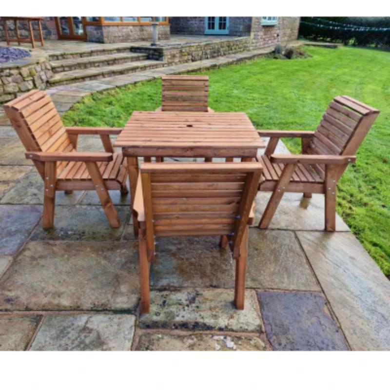 Churnet Valley square outdoor dining set with four wooden chairs and a slatted table in natural finish.