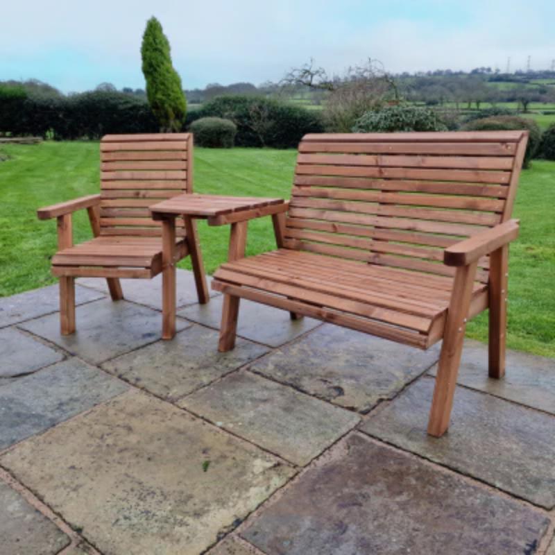 Churnet Valley Trio Set angled garden chairs made from natural wood, featuring slatted design and matching side table.