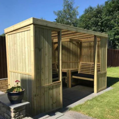 Churnet Valley Riviera enclosed garden room with wooden frame and built-in seating, surrounded by green grass.