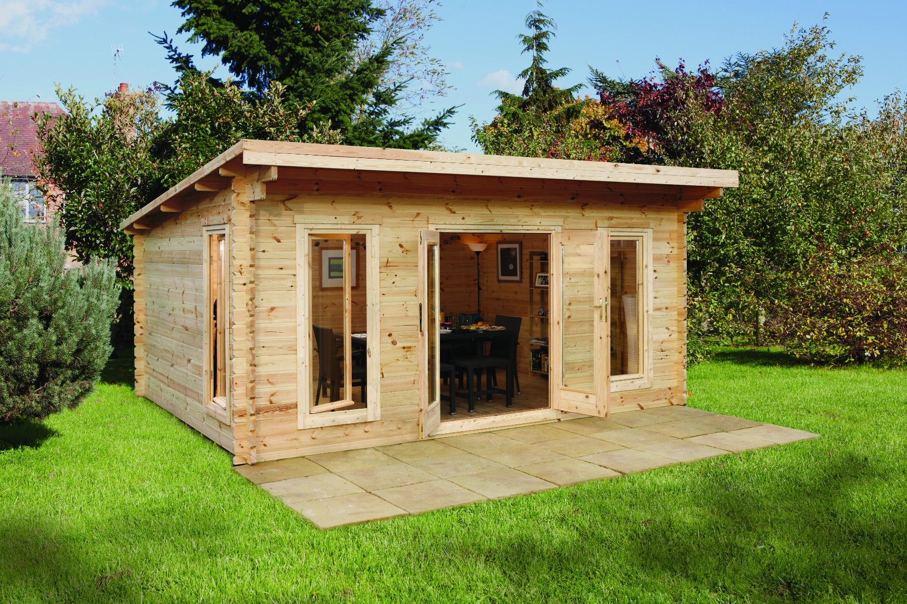 Forest Garden log cabin with pent roof, double glazed windows, natural wood finish, and stone patio on grass.